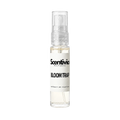 "A small, clear glass spray bottle of Scentivia Perfumes' 'Bloom trap
' Extrait de Parfum featuring an off-white label and clear cap, set against a black background."