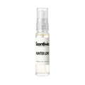 "A small, clear glass spray bottle of Scentivia Perfumes' 'Hunter lord' Extrait de Parfum featuring an off-white label and clear cap, set against a black background."