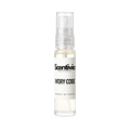 "A small, clear glass spray bottle of Scentivia Perfumes' 'Ivory Code' Extrait de Parfum featuring an off-white label and clear cap, set against a black background."