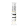 "A small, clear glass spray bottle of Scentivia Perfumes' 'Midnight dues' Extrait de Parfum featuring an off-white label and clear cap, set against a black background."