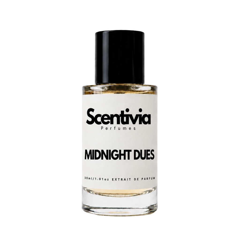 A glass bottle of Scentivia Perfumes 'Midnight Dues' Extrait de Parfum against a black background, featuring a black cap, off-white label, and golden-amber liquid