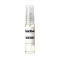 "A small, clear glass spray bottle of Scentivia Perfumes' 'Noir brew' Extrait de Parfum featuring an off-white label and clear cap, set against a black background."
