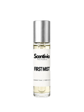 FIRST MIST roll-on perfume by Scentivia in a clear glass bottle with a silver cap, featuring a white label, pale golden fragrance oil, and alcohol-free, 100% oil-based formulation.
