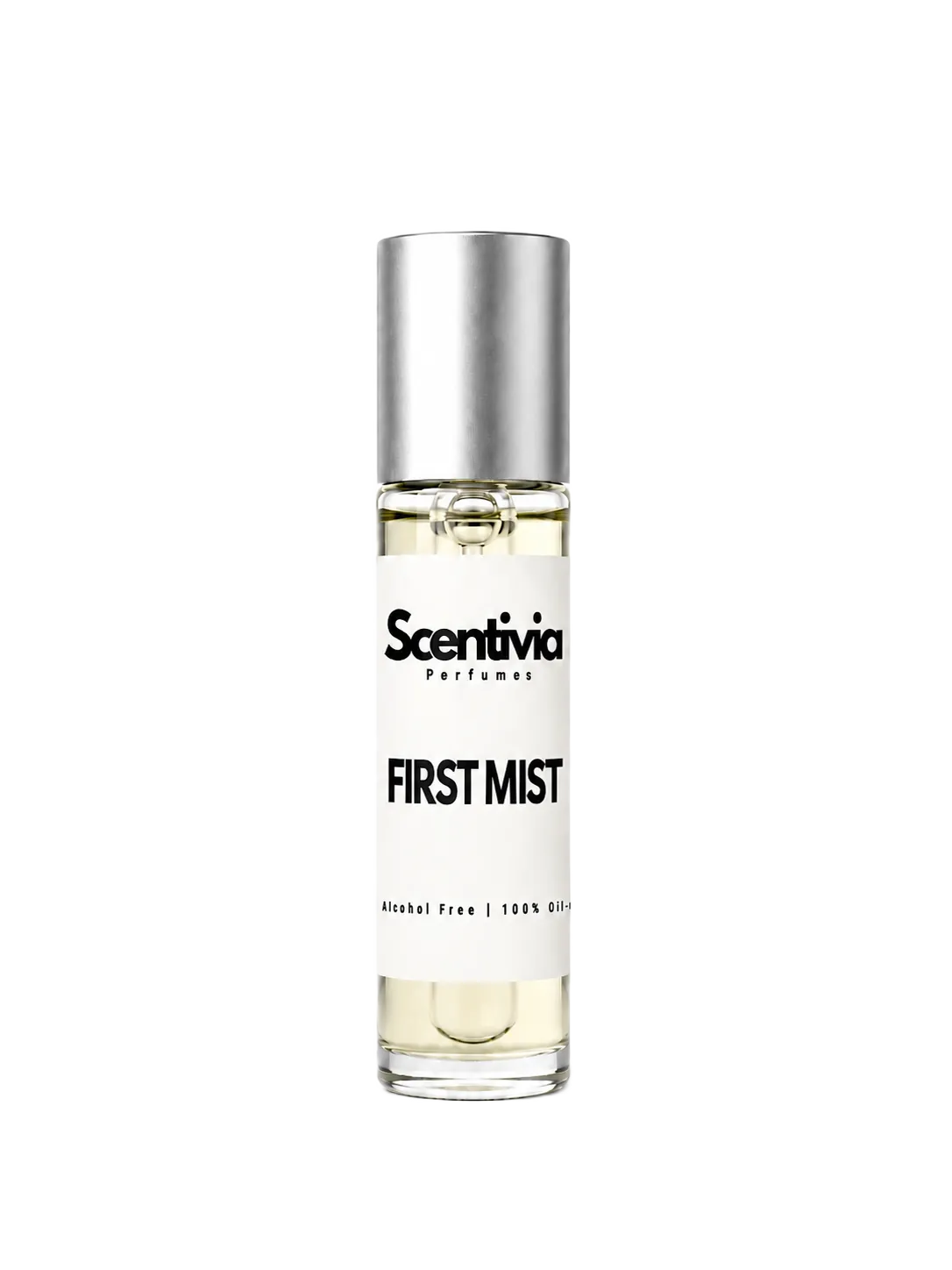 FIRST MIST roll-on perfume by Scentivia in a clear glass bottle with a silver cap, featuring a white label, pale golden fragrance oil, and alcohol-free, 100% oil-based formulation.
