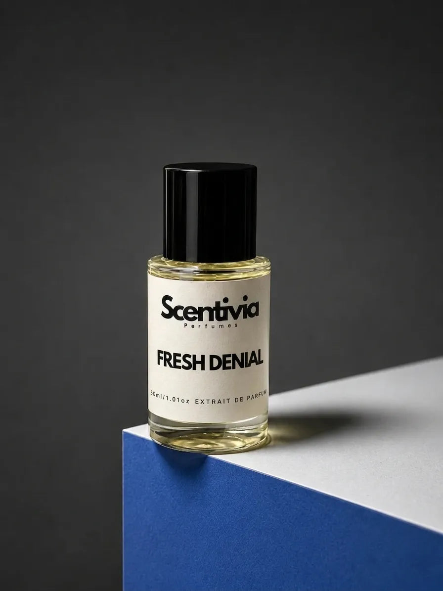 Scentivia Perfumes FRESH DENIAL 30ml extrait de parfum bottle mockup showcased on a modern blue and white geometric podium setup against a dark grey studio background.