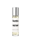 FROST DRIFT roll-on perfume by Scentivia in a clear glass bottle with a silver cap, featuring a white label, pale golden fragrance oil, and alcohol-free, 100% oil-based formulation.
